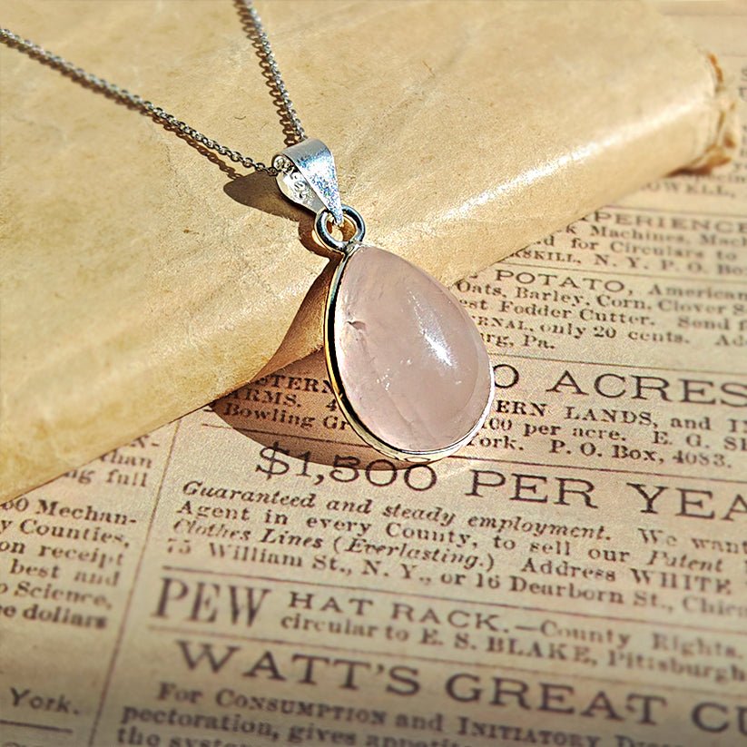 //mysticaltienda.com/cdn/shop/files/colgante-danu-cuarzo-rosa-y-plata-de-ley-925-468274.jpg?v=1728535228