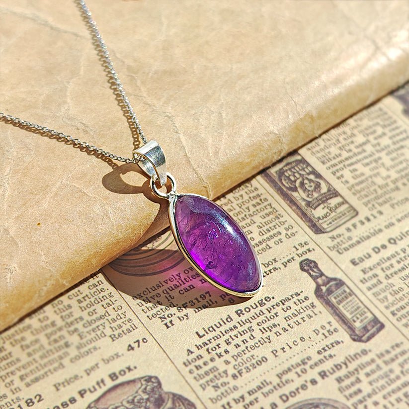//mysticaltienda.com/cdn/shop/files/colgante-lagrima-amatista-y-plata-de-ley-925-392648.jpg?v=1728535278