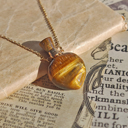 Collar Botella Mágica – Ojo de Tigre & Acero Inox. Dorado - Mystical Tienda