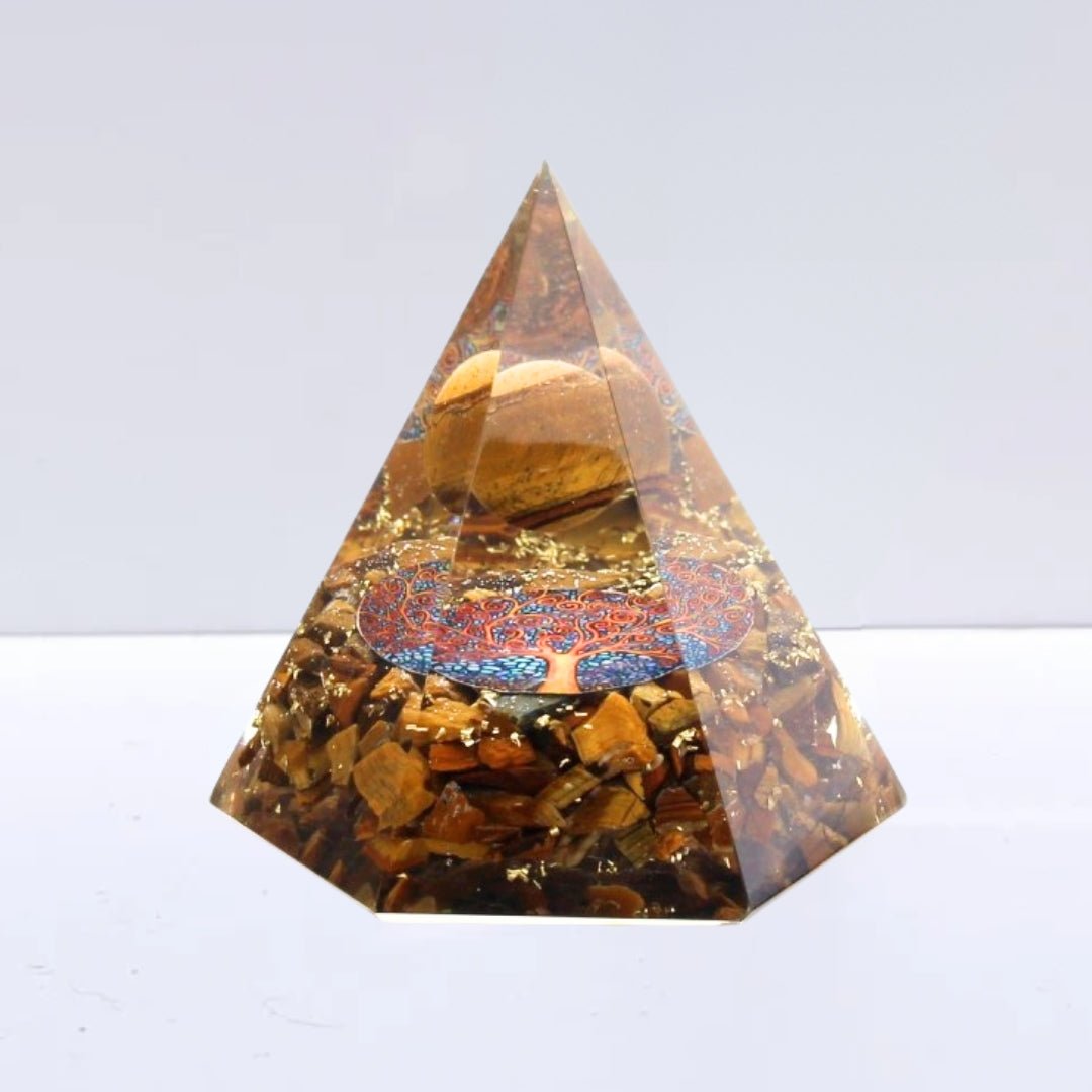 //mysticaltienda.com/cdn/shop/files/piramide-orgonita-sacred-ojo-de-tigre-con-arbol-de-la-vida-196809.jpg?v=1727367253