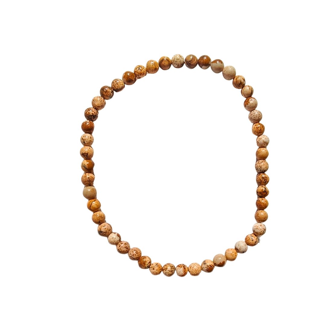//mysticaltienda.com/cdn/shop/files/pulsera-de-jaspe-paisaje-bola-lisa-992898.jpg?v=1726851351